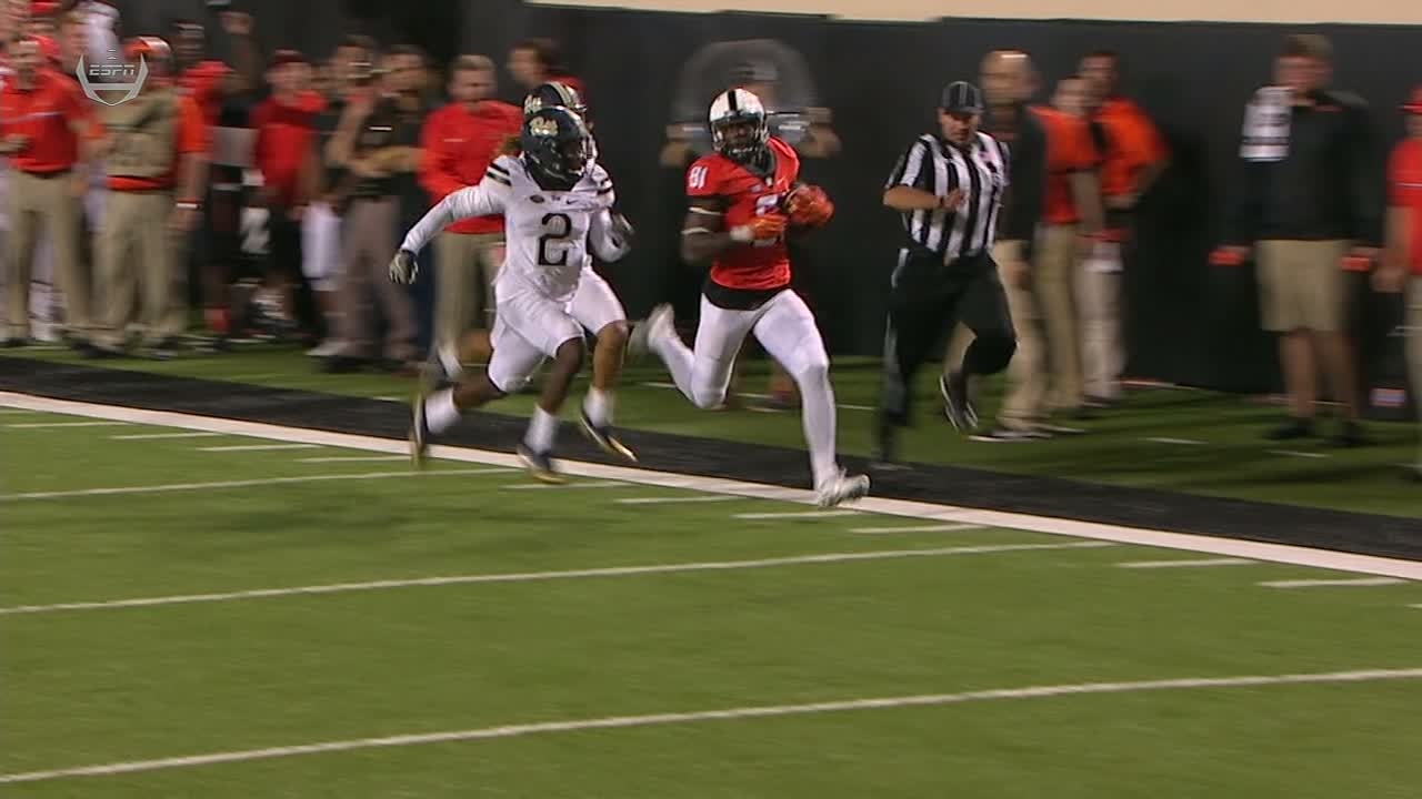 M. Rudolph 86 yd pass to J. Seales to set up Oklahoma State at the 1 yd line