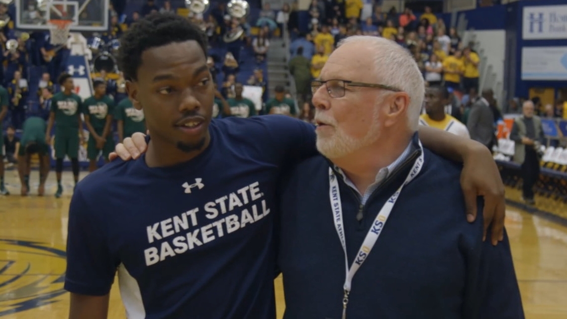 Kent State players and fans stand in unity during national anthem