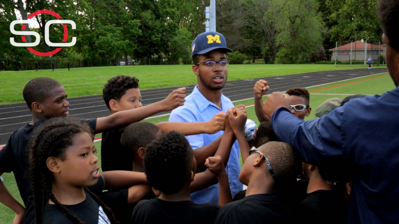 Michigan's Evans giving back during offseason