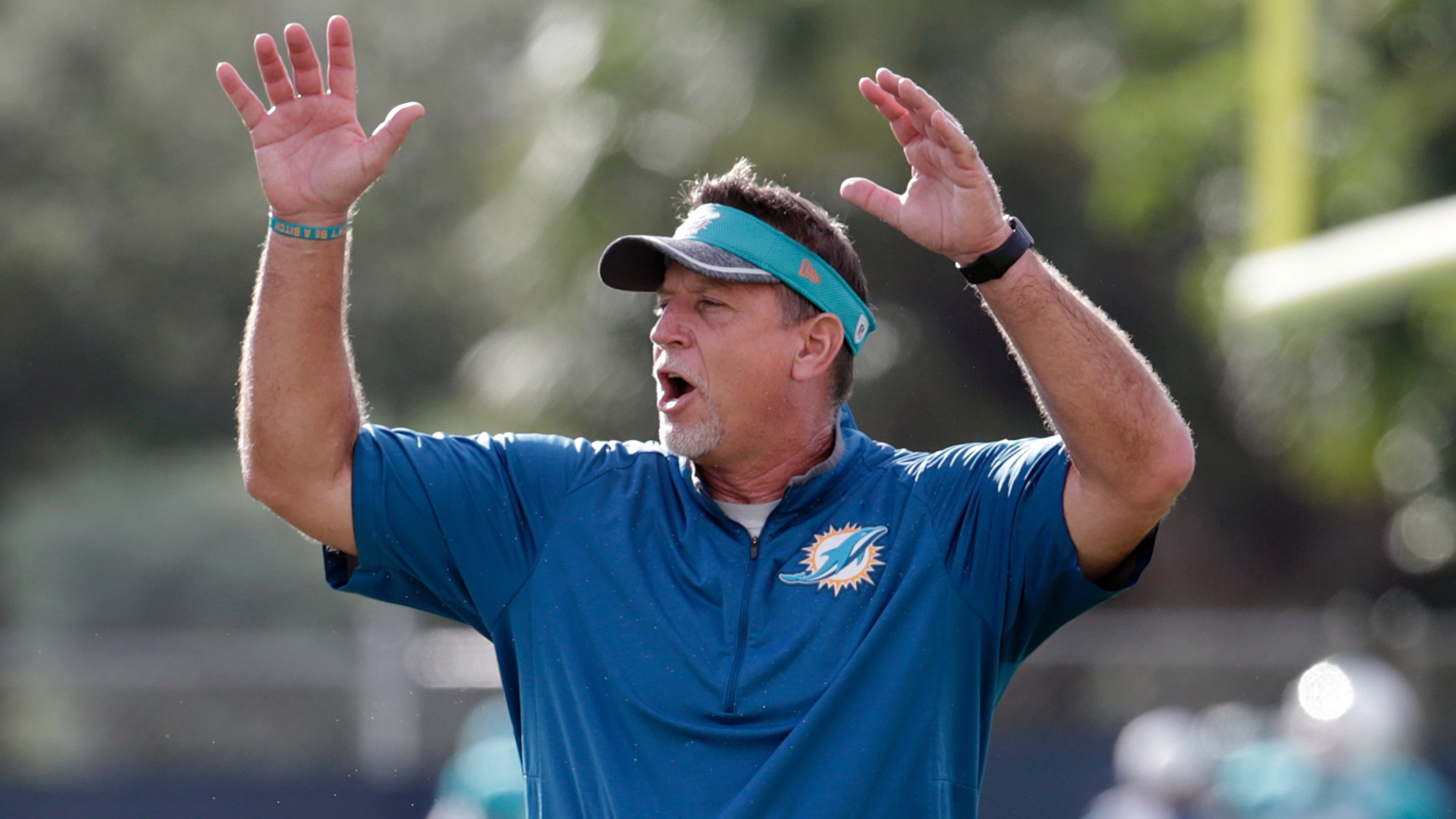 Woman already had plans to record Dolphins' coach