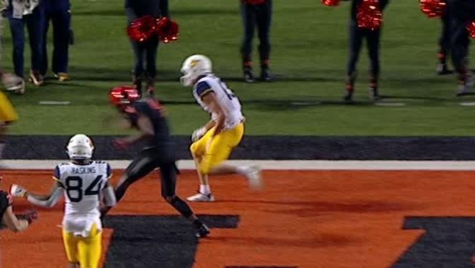 Oklahoma State's late TD, big stop seal upset of West Virginia