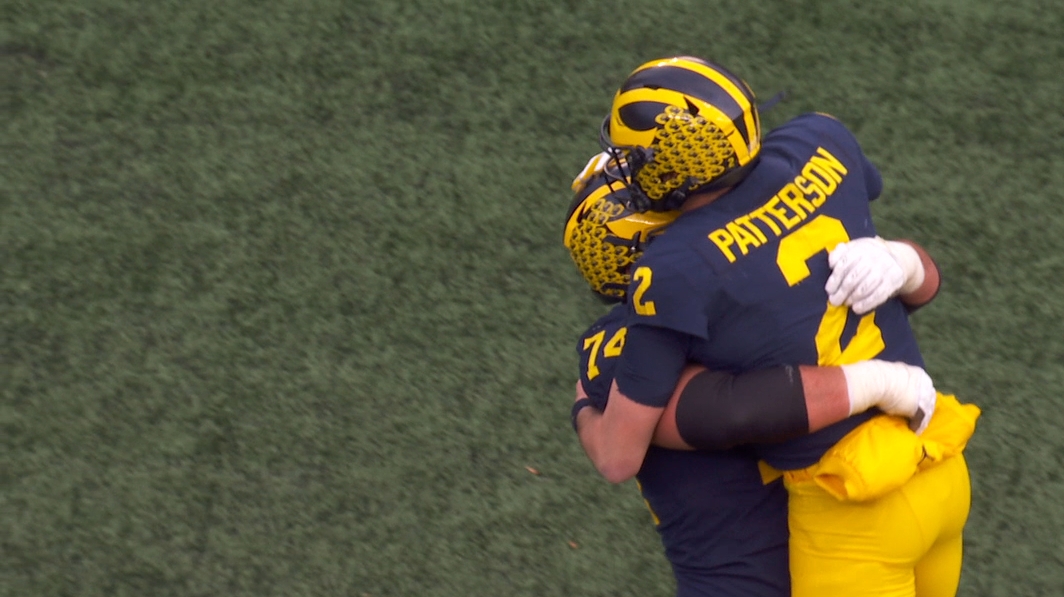 Michigan pours it on with late TD