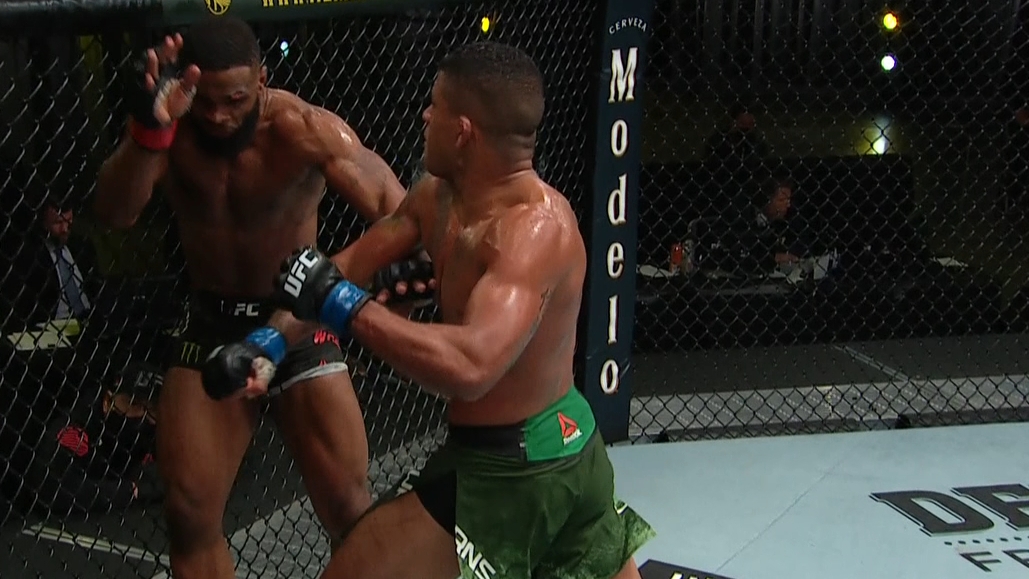 Burns floors Woodley with a devastating combo in Round 4
