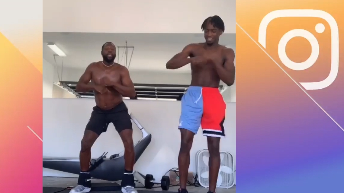 D-Wade and his son take a dance break during workout