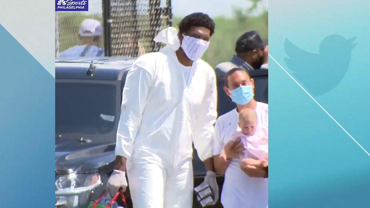 Embiid departs for NBA bubble in hazmat suit