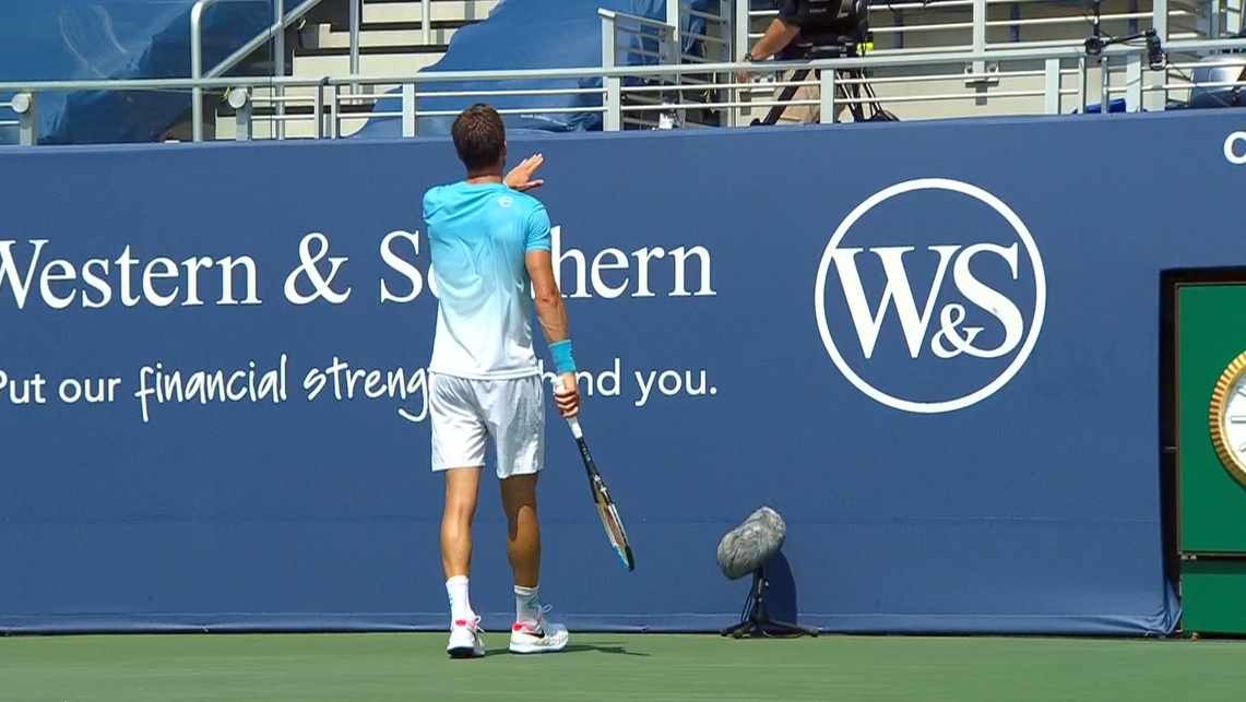 Frustrated Bedene accidently hits a cameraman with ball