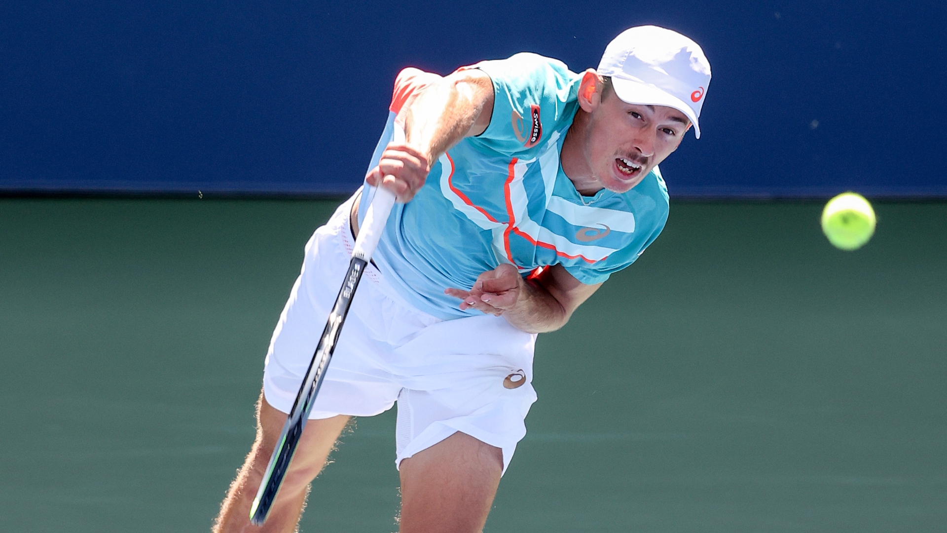 De Minaur on to quarters with straight-sets win
