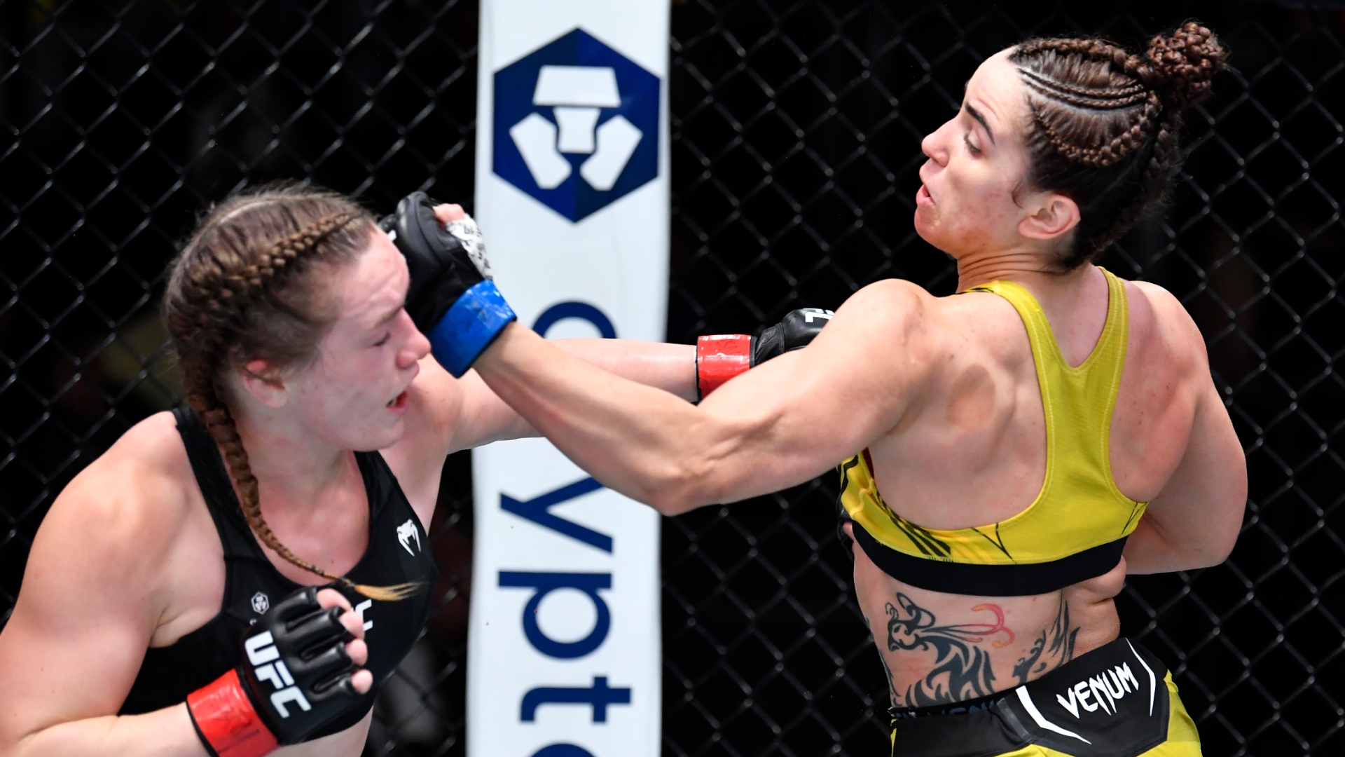 Norma Dumont landing a straight right on Aspen Ladd
