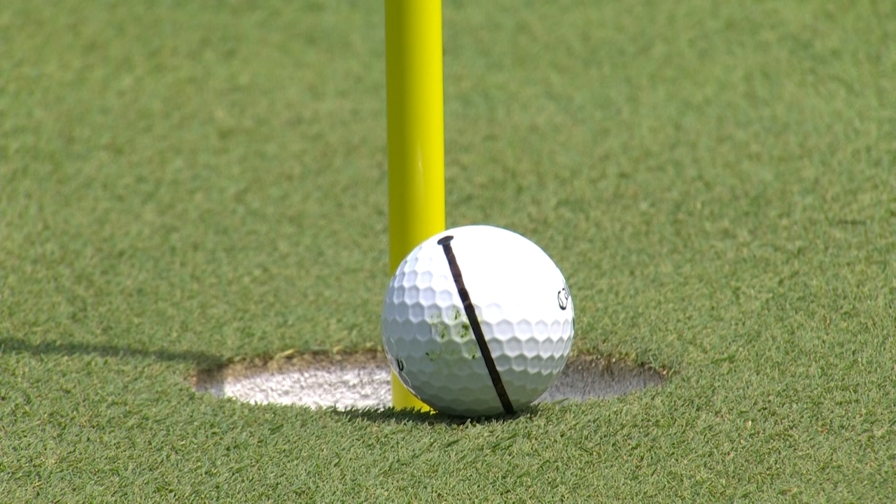 Xander Schauffele's shot gets as close as it can get without going in