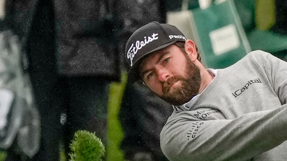 Cam Young chips in from off the green for birdie on 1st hole