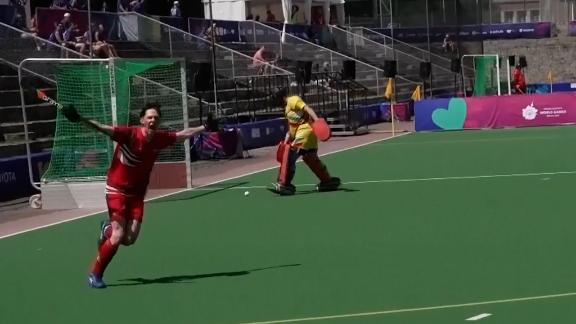 Great Britain's Craig Williamson speaks after winning gold in field hockey