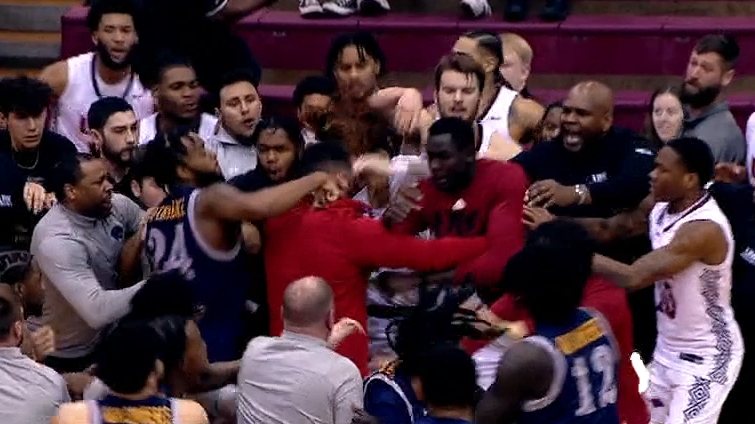 Brawl erupts in handshake line after college basketball game