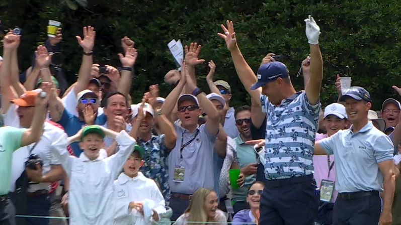 Gary Woodland rolls in the ace