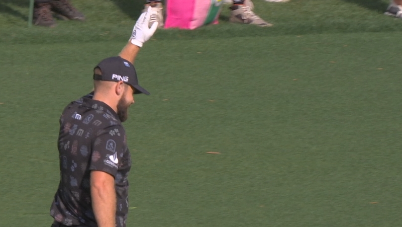 Tyrrell Hatton sinks a birdie from the fairway