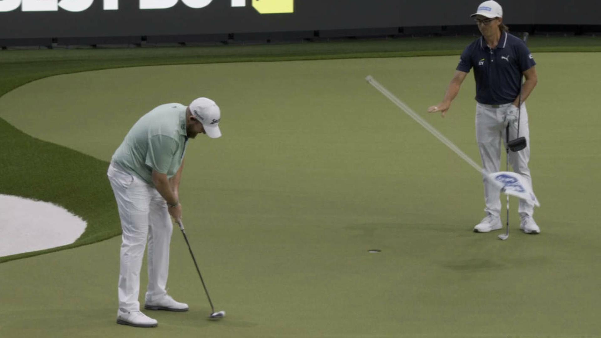 Rickie Fowler trolls arena by throwing flag in front of Shane Lowry's putt