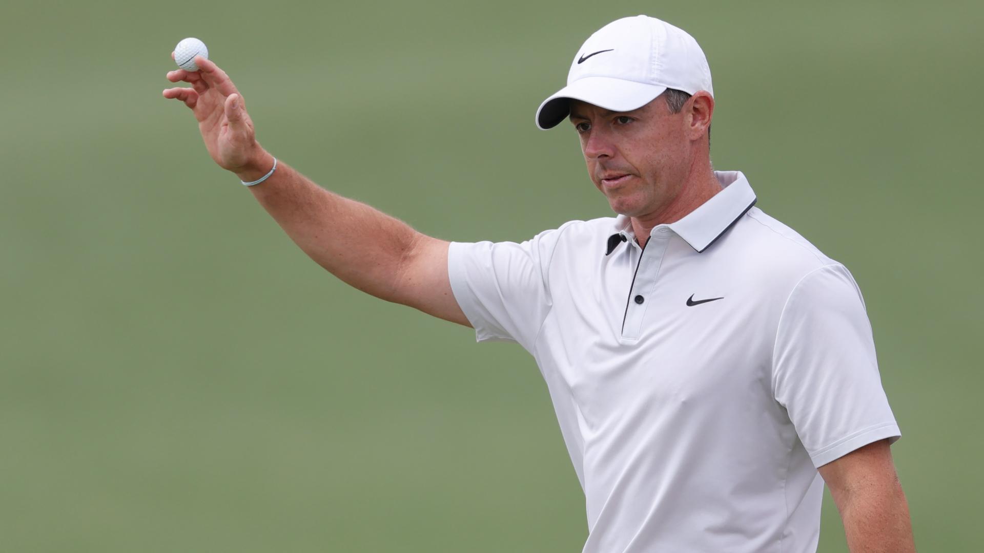 Rory McIlroy chips in for eagle to take the lead