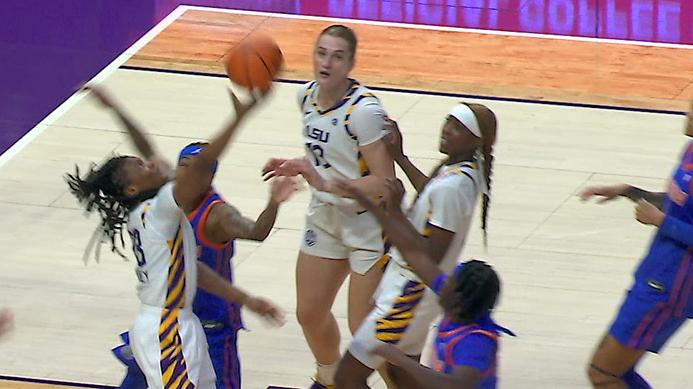 MiLaysia Fulwiley nonchalantly banks in a backwards layup