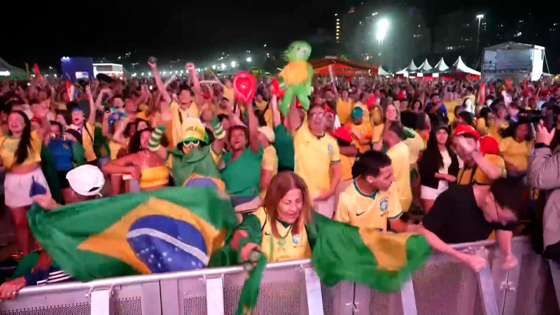 Fans on Copacabana Beach celebrate Brazil's equalizer vs. Morocco