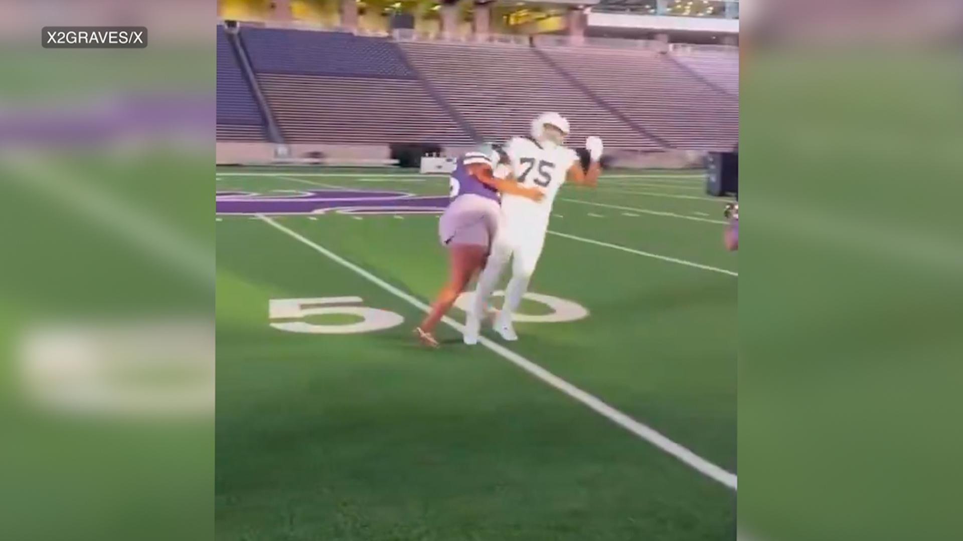 Recruit gets tackled by mom during Kansas State photo shoot