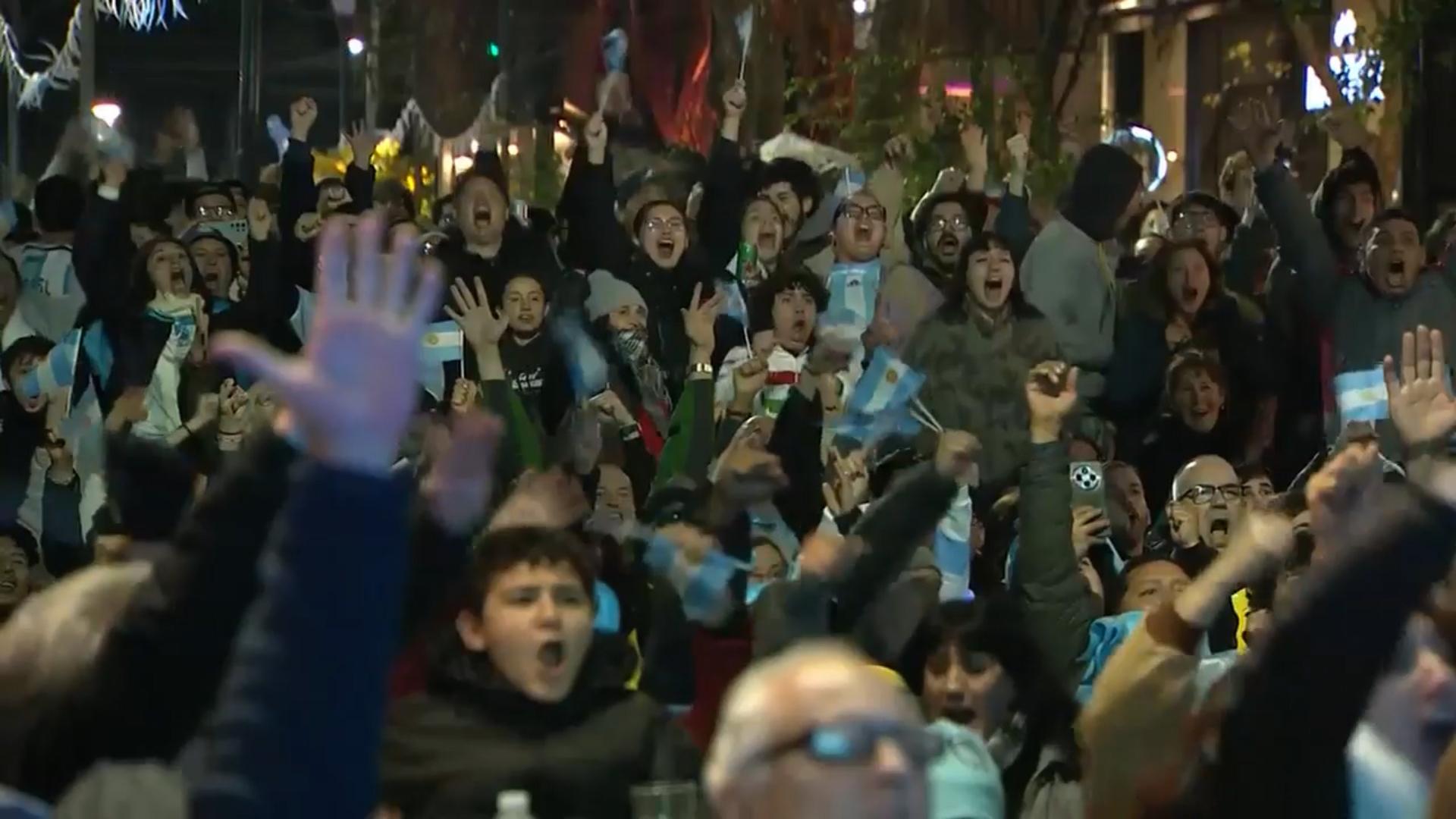 Argentina fans in Buenos Aires react to Messi's hat trick goal vs. Algeria