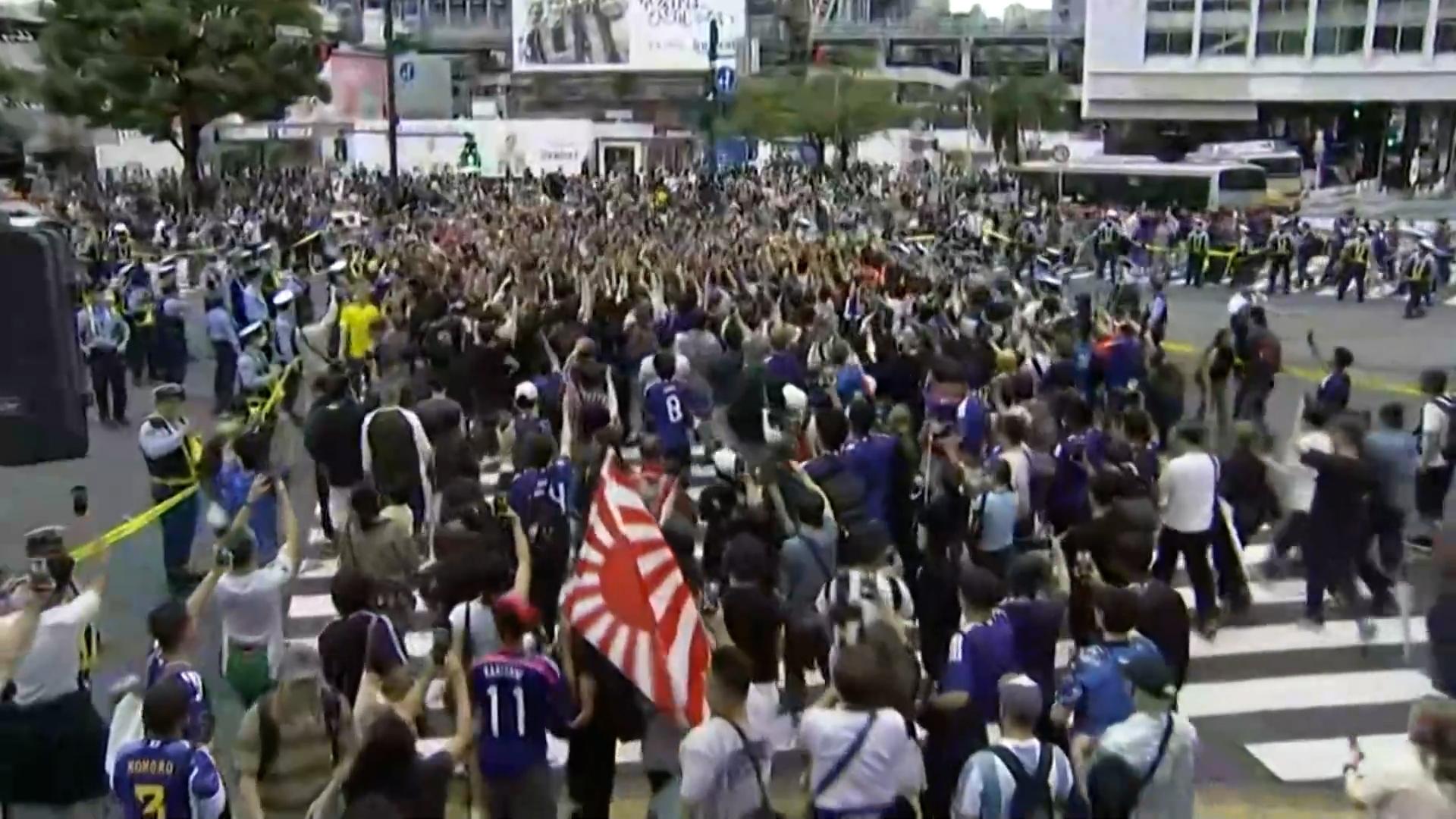Japan fans take over Tokyo's Shibuya Crossing after reaching knockouts