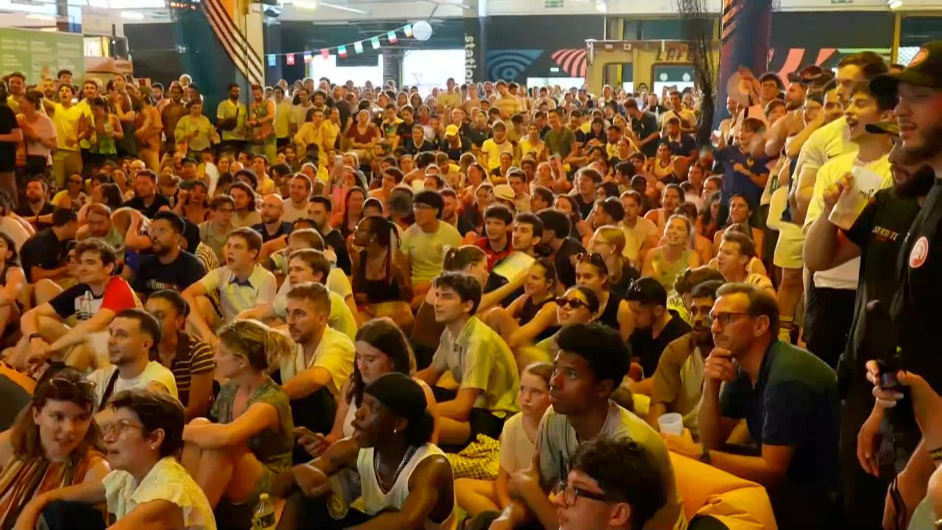 Fans in Paris celebrate as Dembele gives France the lead against Norway