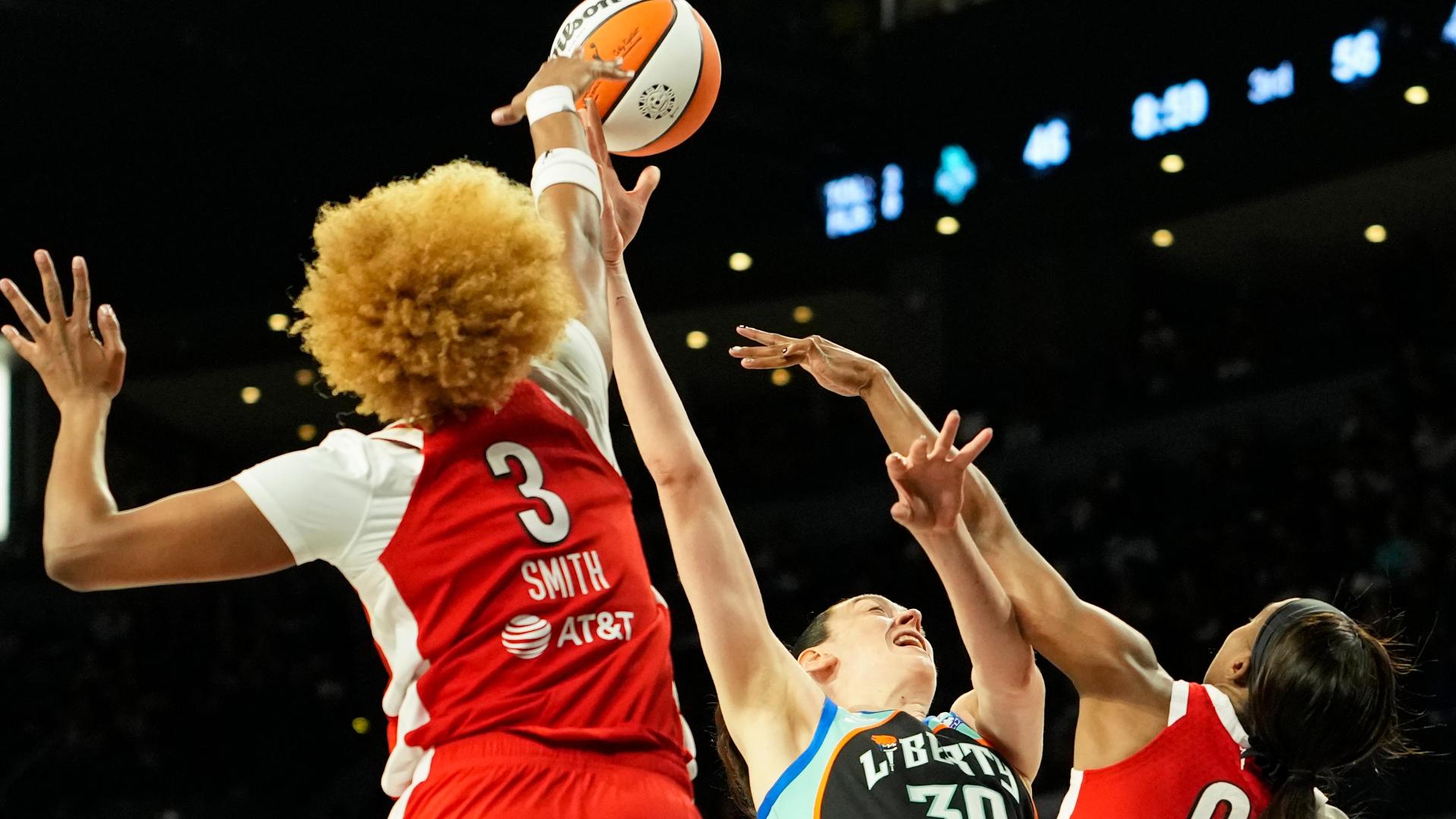 Wilson, Young help the Aces beat the Liberty 104-99