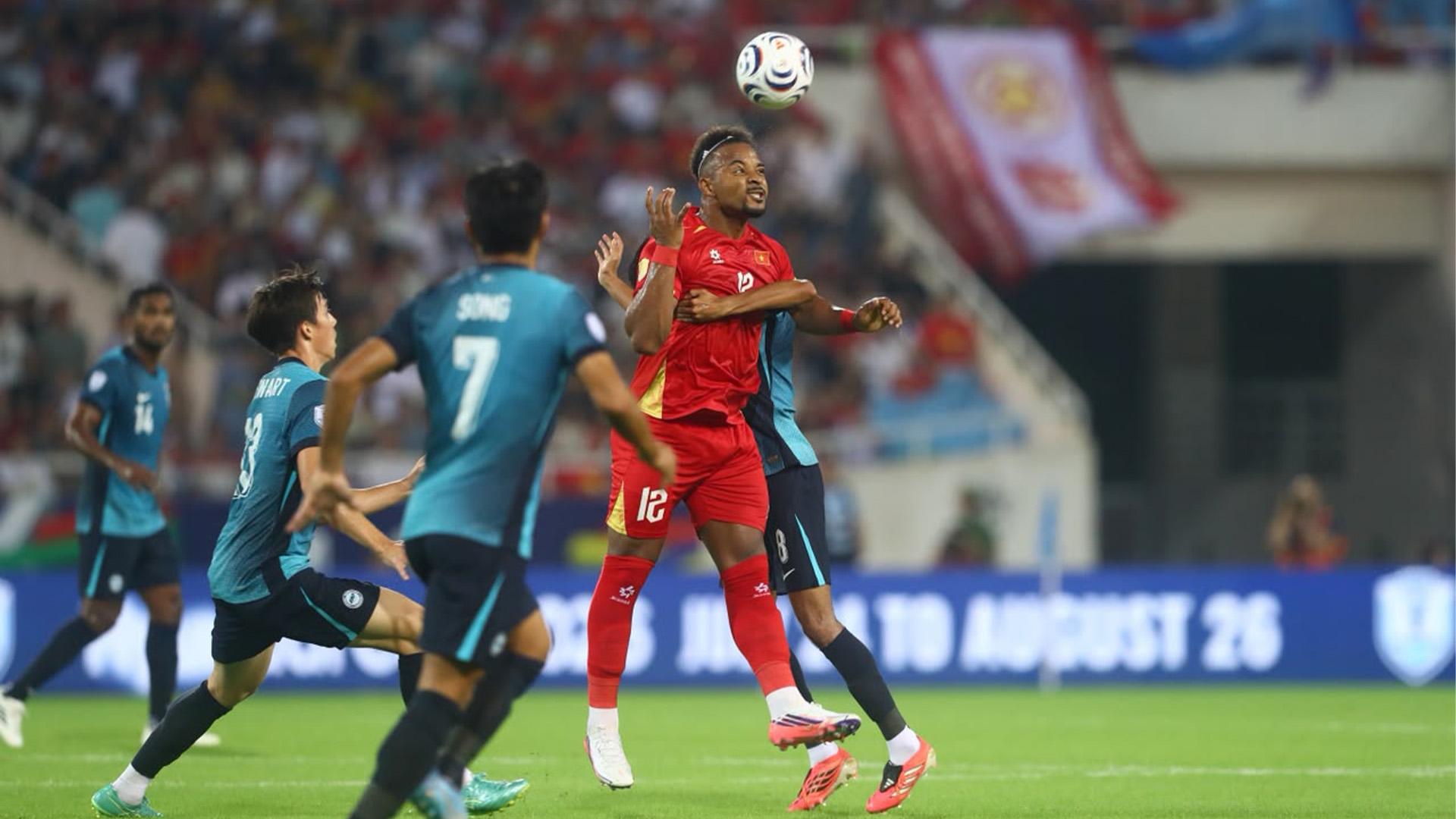 Singapore survive Vietnam onslaught to stay top of Group A