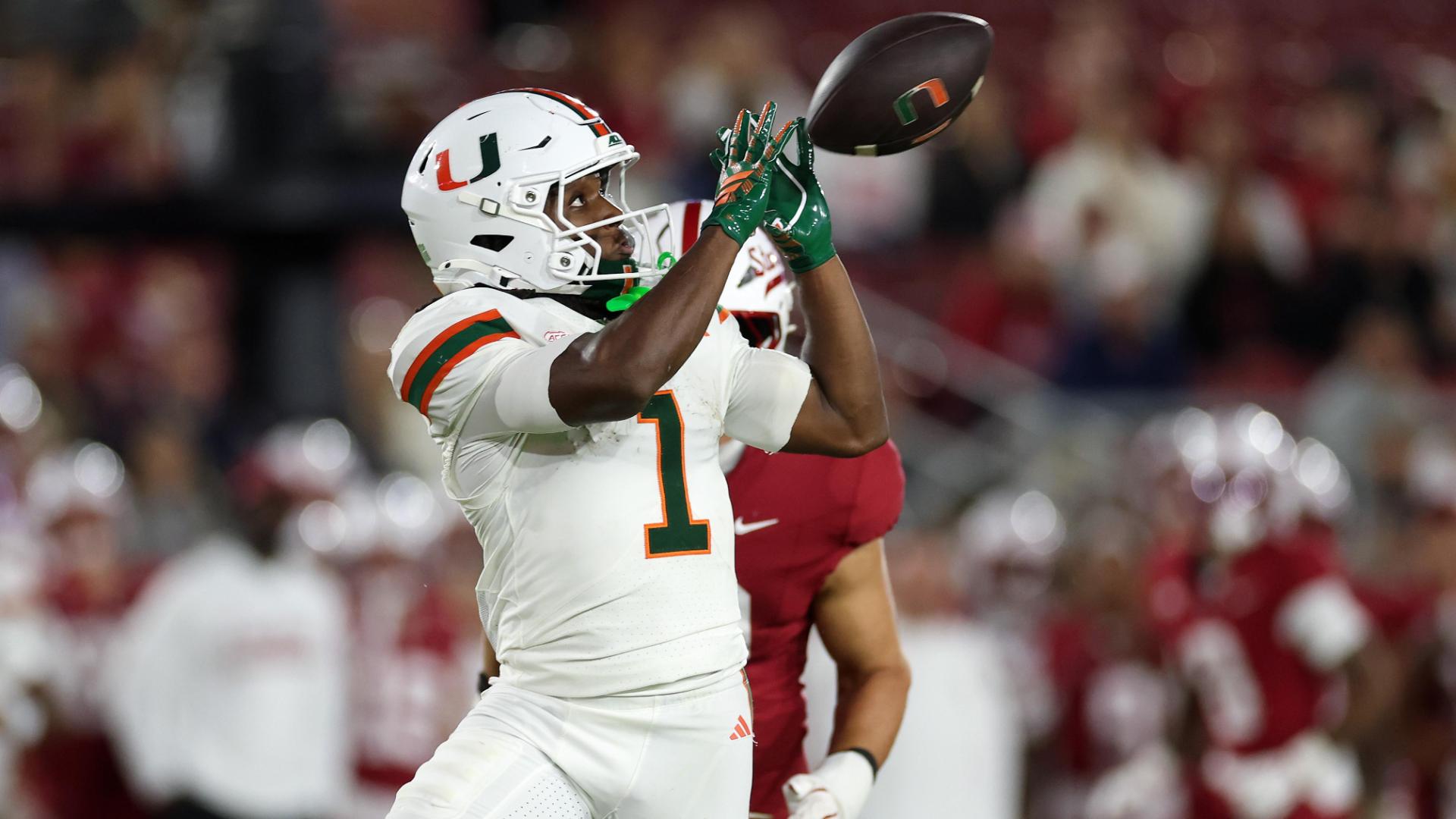 Mensah throws 5 TD passes, Toney sets record in No. 7 Miami's 45-6 win over Stanford
