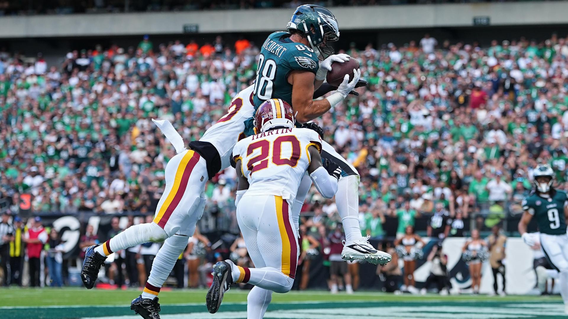 Jalen Hurts throws 3 TD passes and Eagles stuff Commanders' late 2-point try for 24-22 win