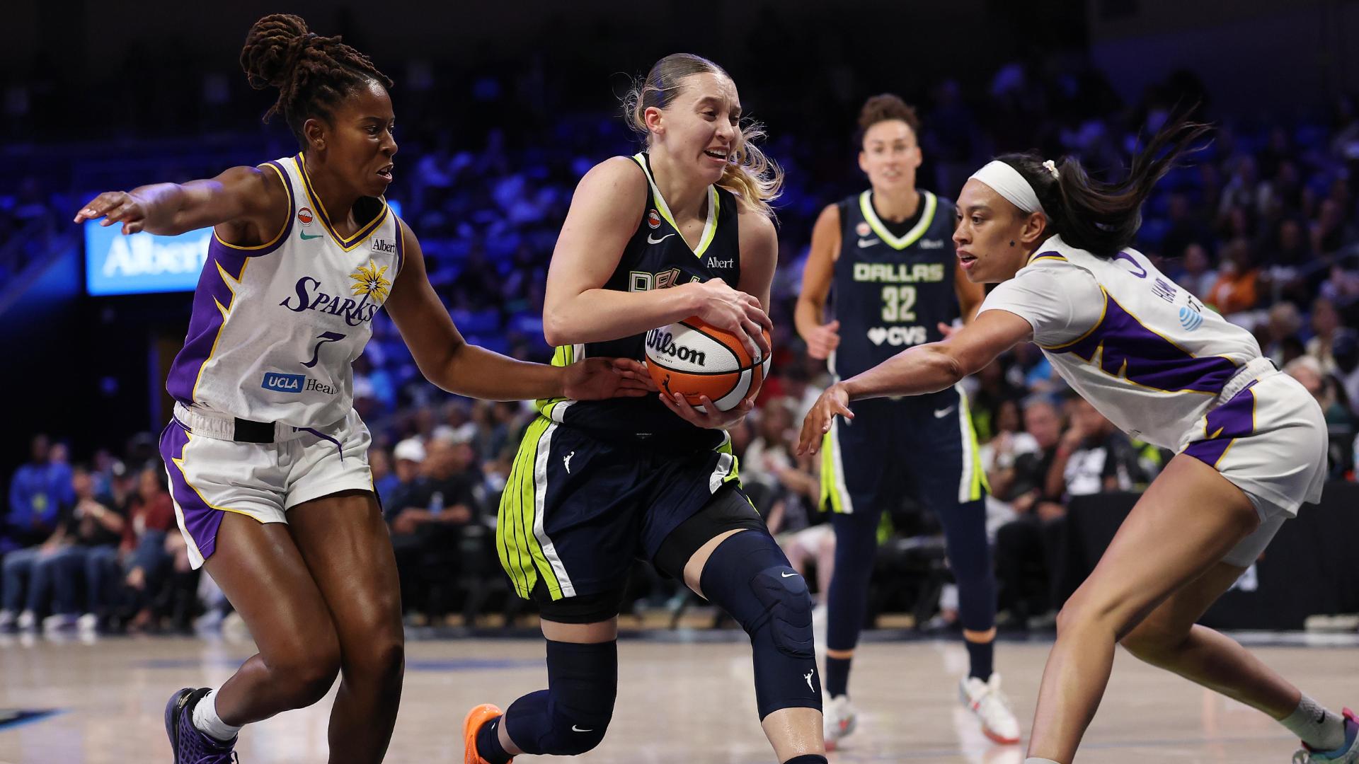 Wings pull away from Sparks for win