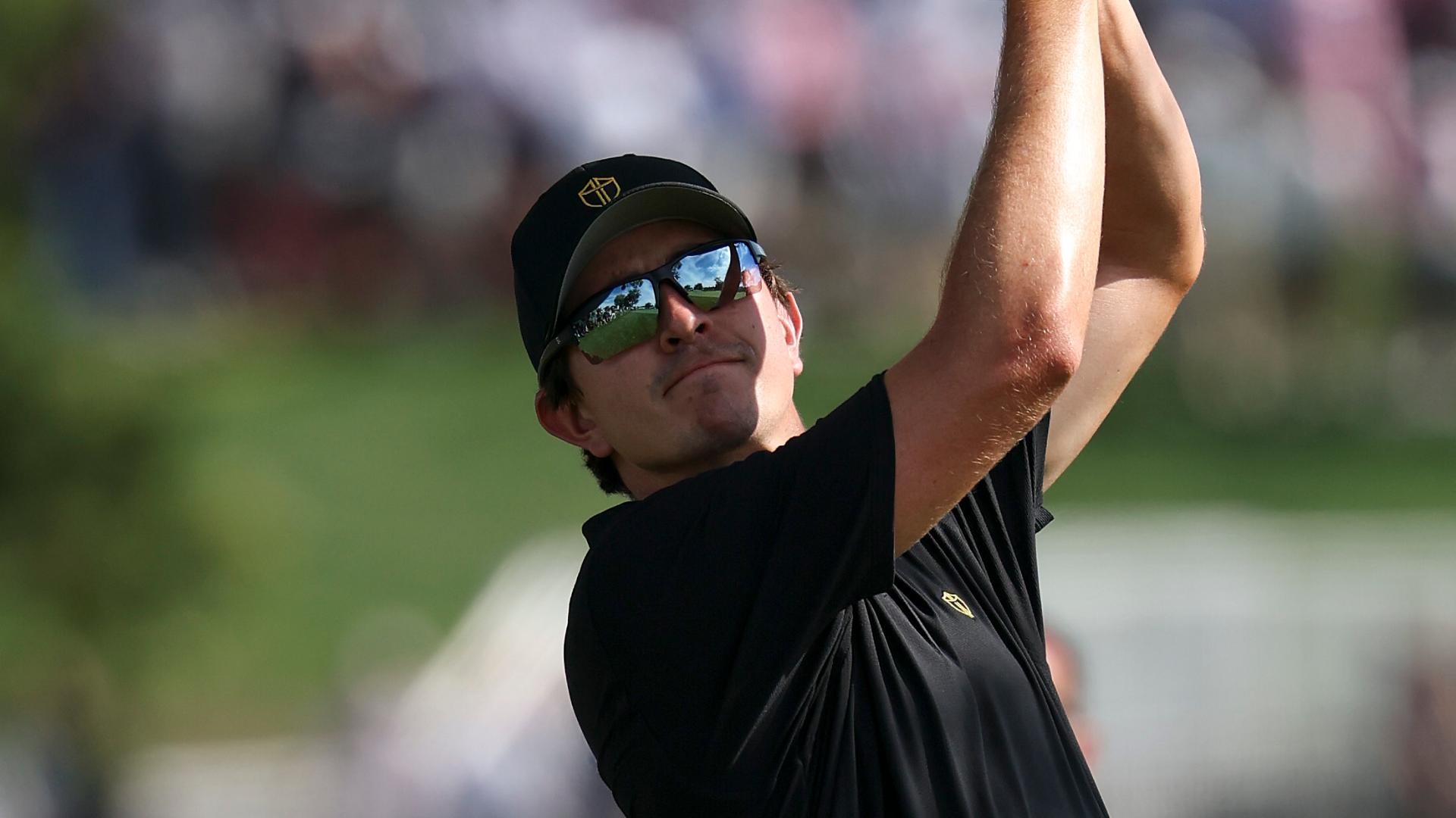 Fan yells out during Nico Echavarria's swing