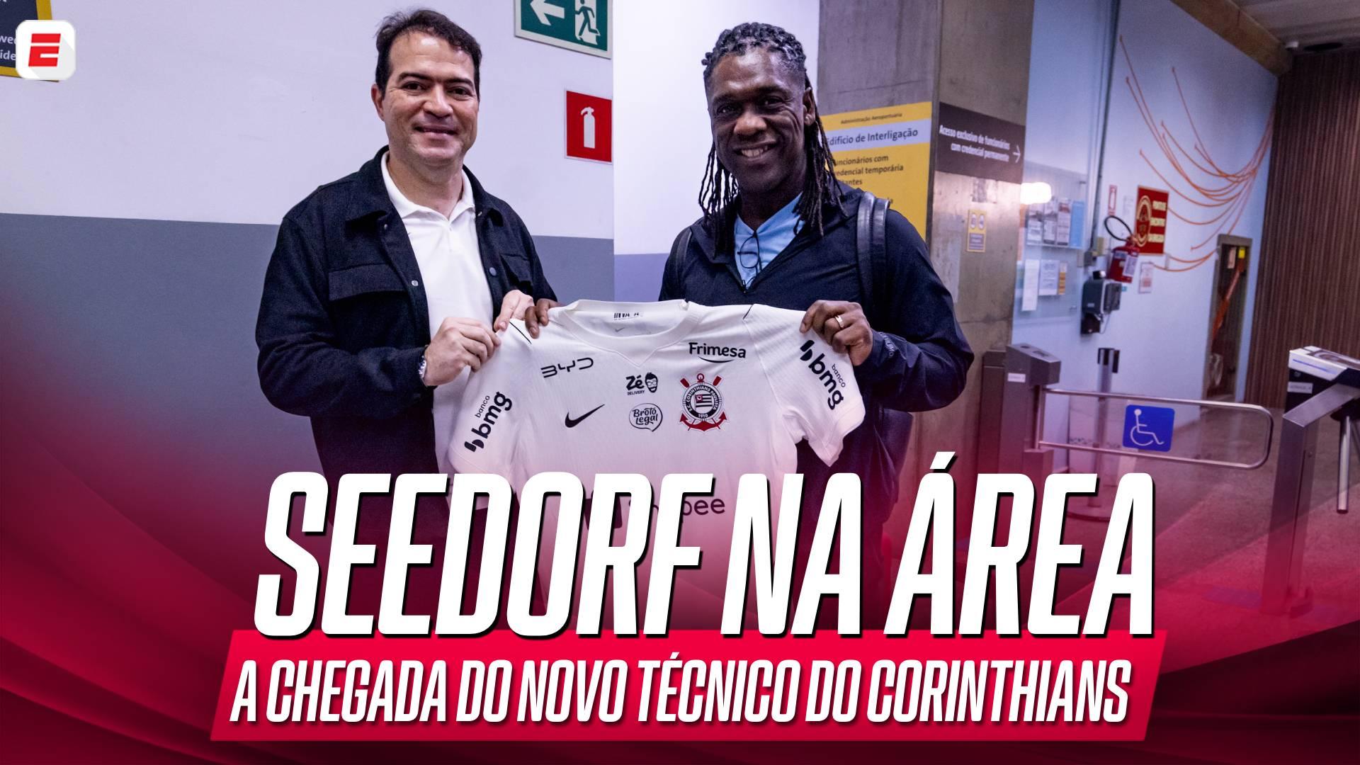 Seedorf recebe camiseta do Corinthians de Marcelo Paz em desembarque no aeroporto e vai direto para o CT