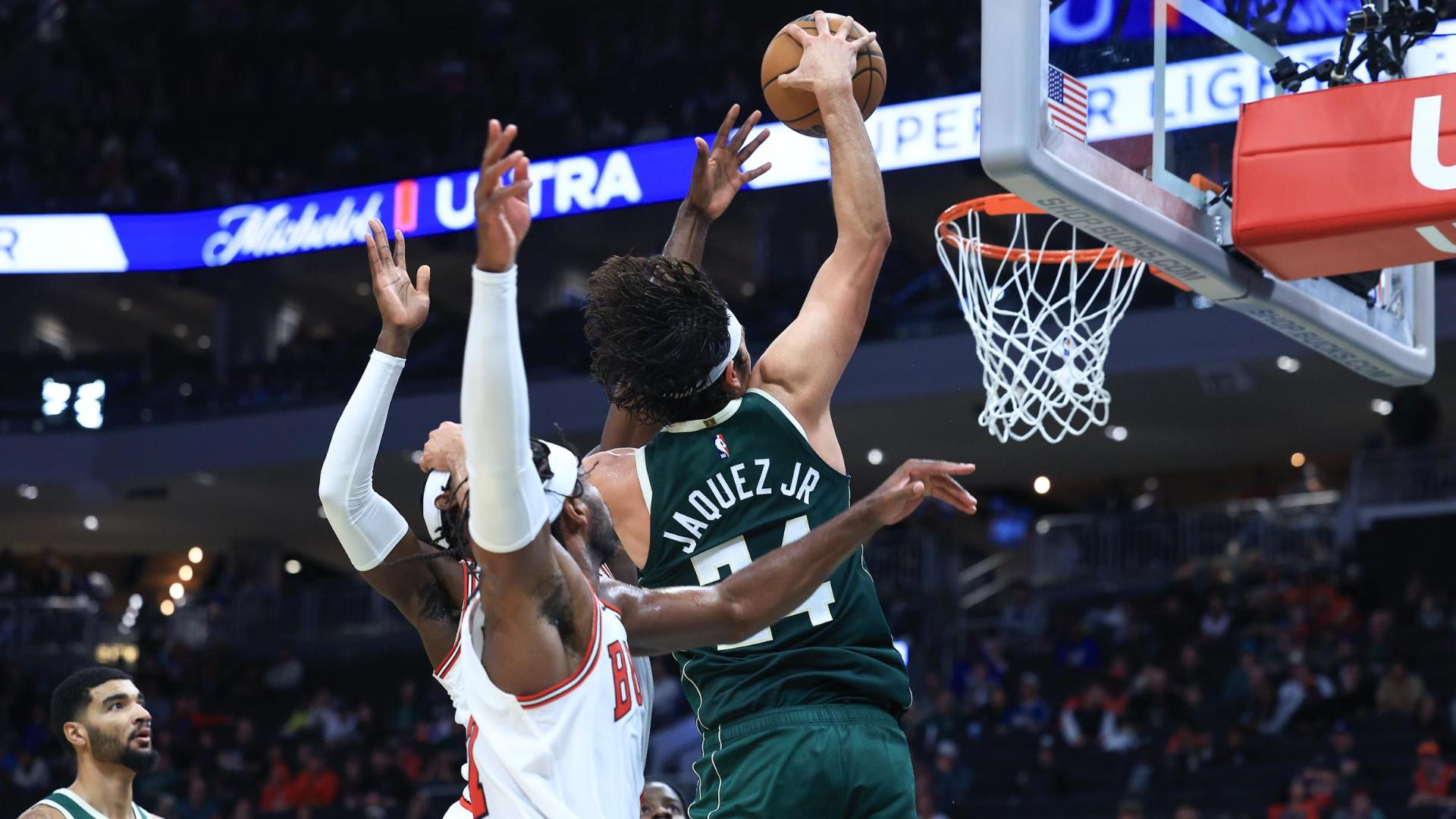 Powell scores 25 points to help the Bulls hold off the Bucks, 132-125