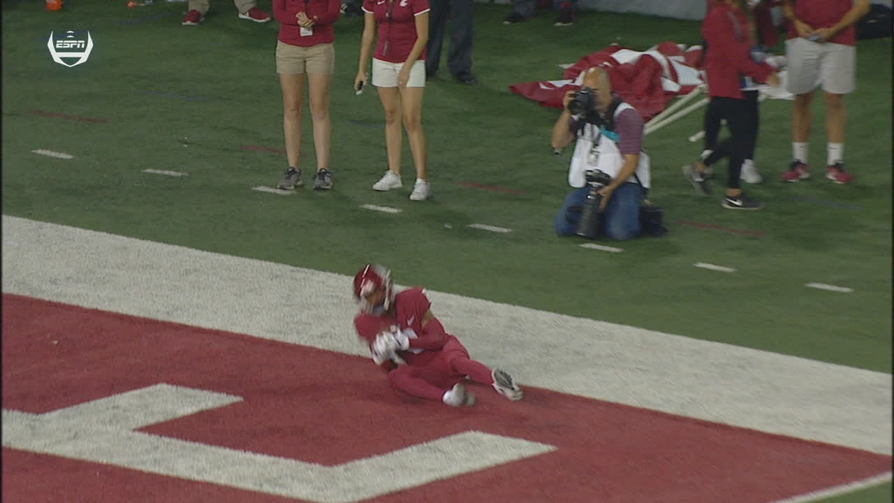 Washington State's Calvin is wide up and makes TD catch