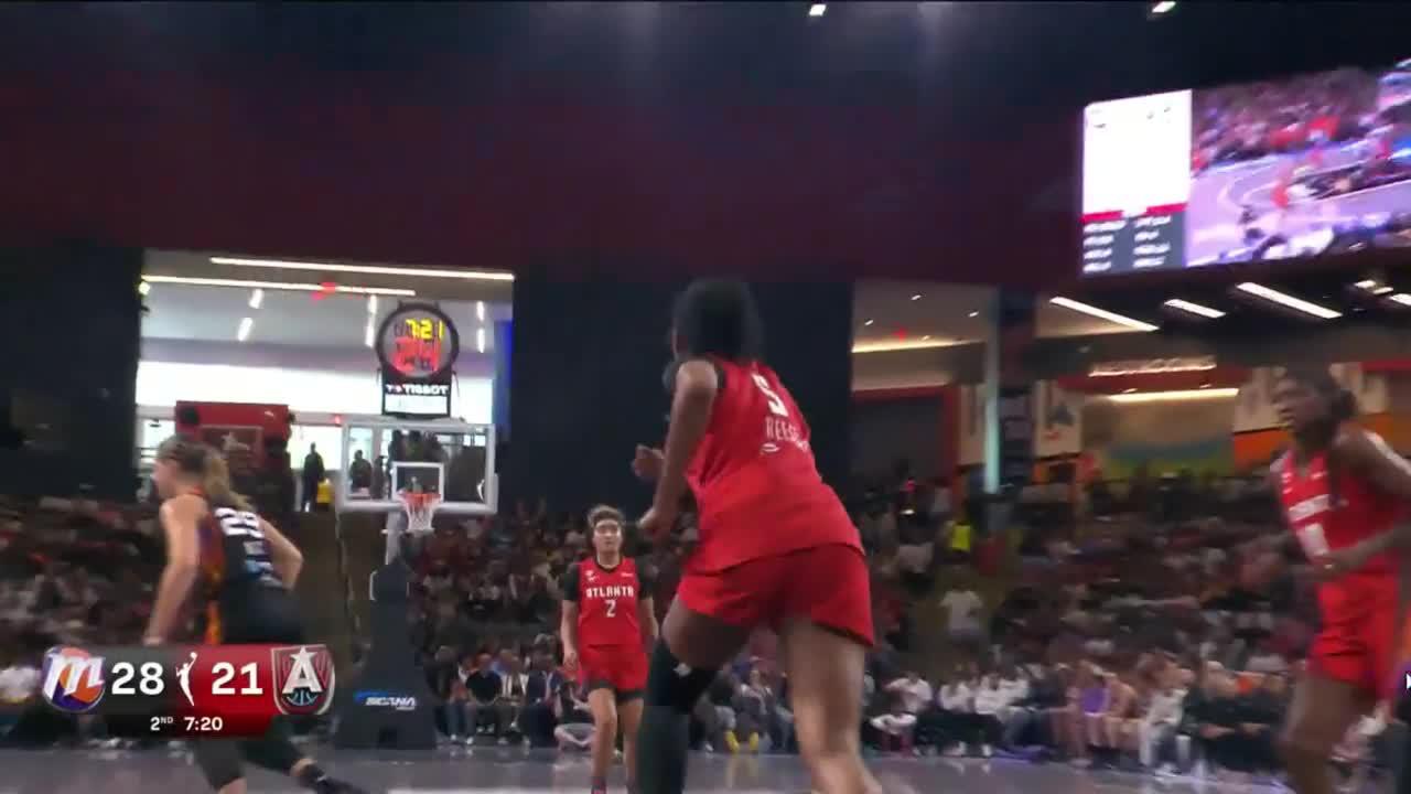 Angel Reese hits the basket