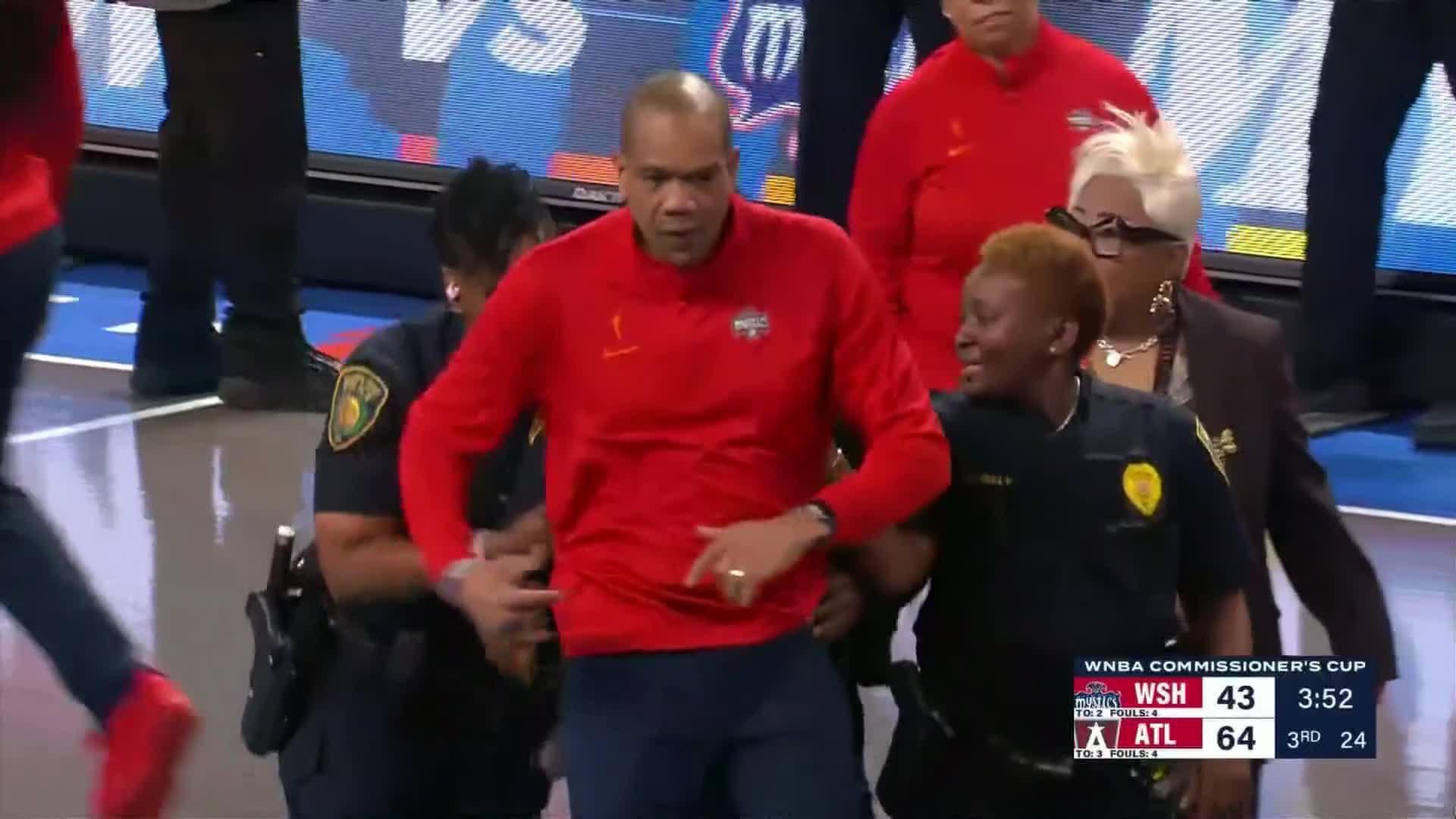 Mystics coach Sydney Johnson escorted out after heated reaction to Angel Reese foul call