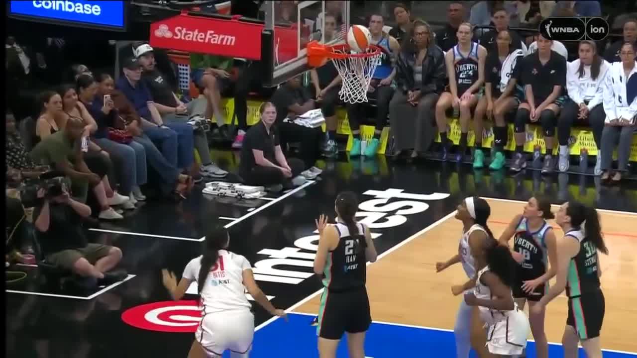 Lauren Betts gets the and-1 to fall