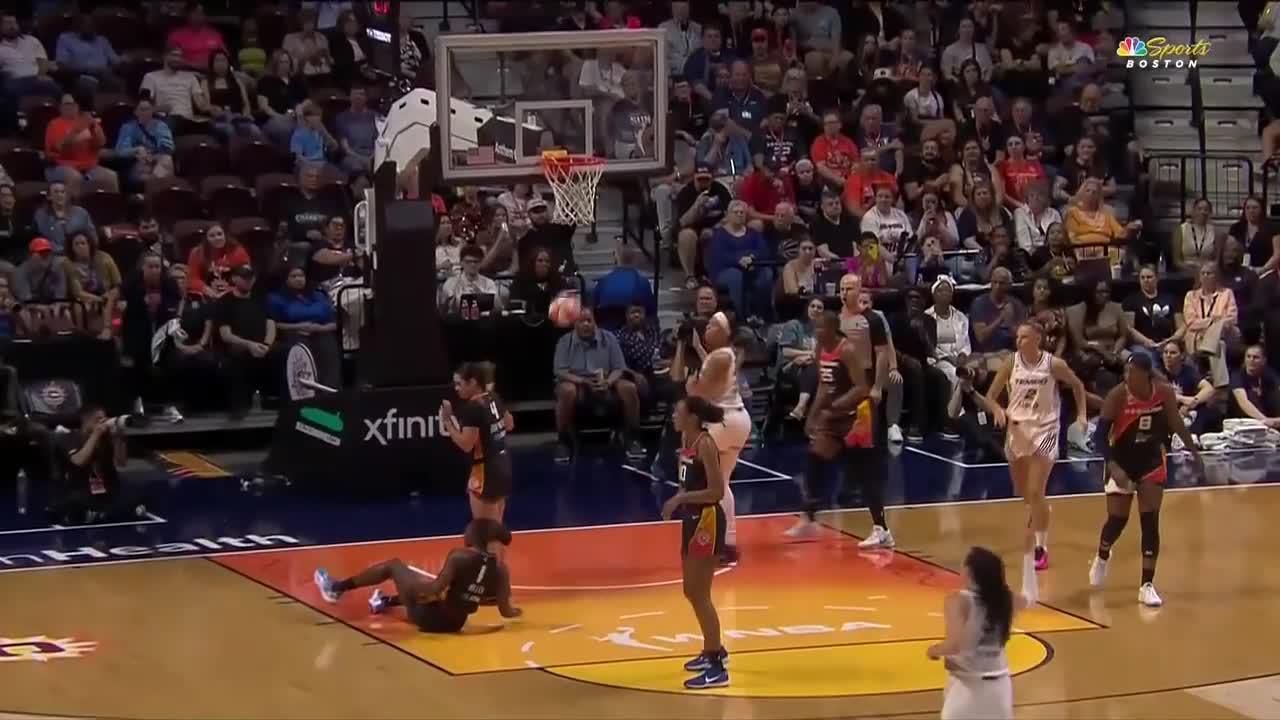 Isabelle Harrison gets the and-1 to fall