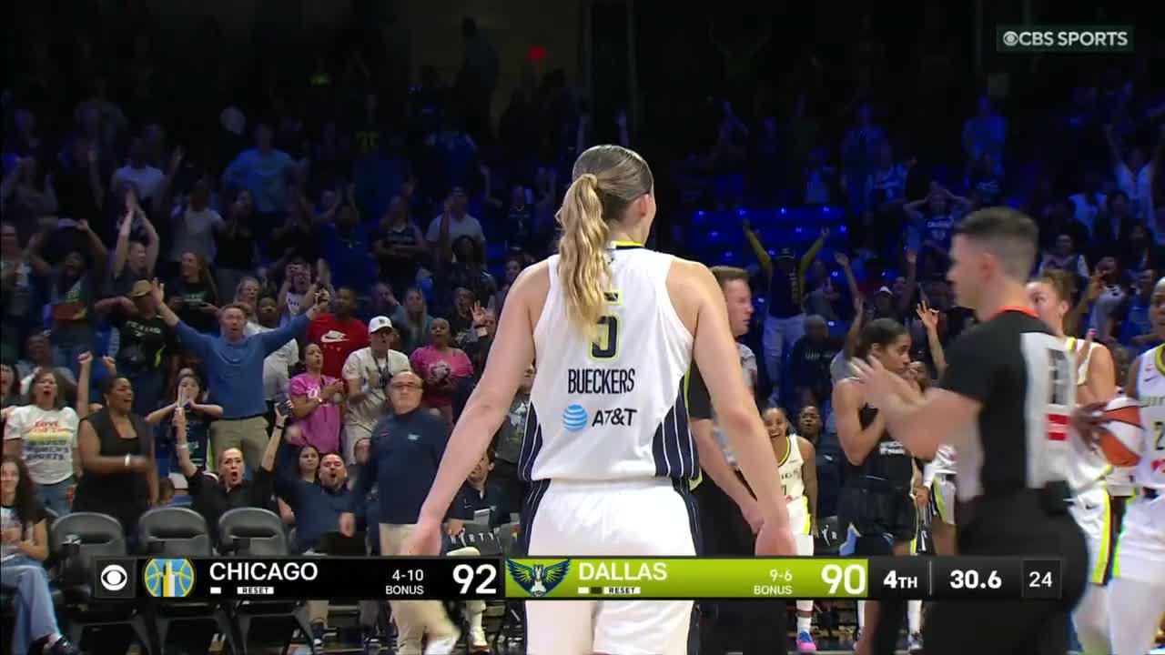 Paige Bueckers gets the and-1 to fall