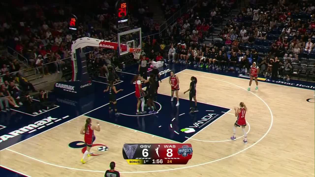 Lauren Betts fights off defender for and-1