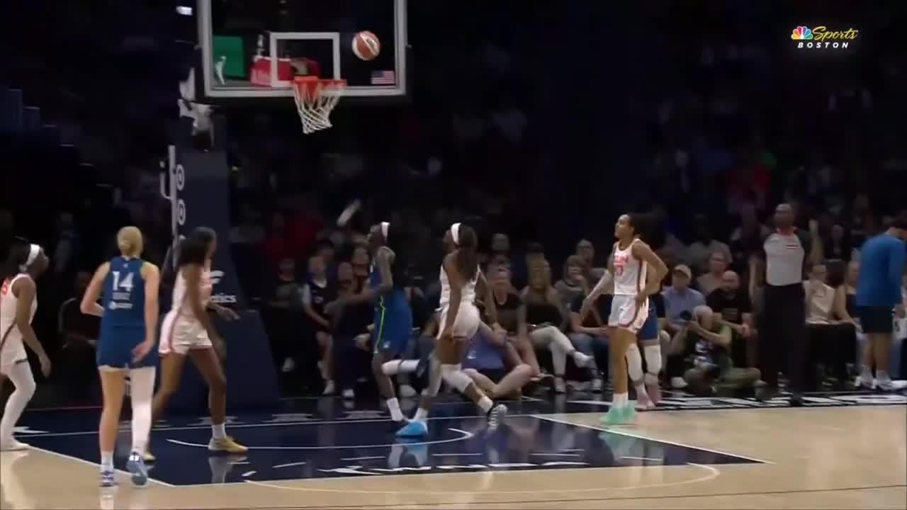 Natasha Howard gets the and-1 to fall