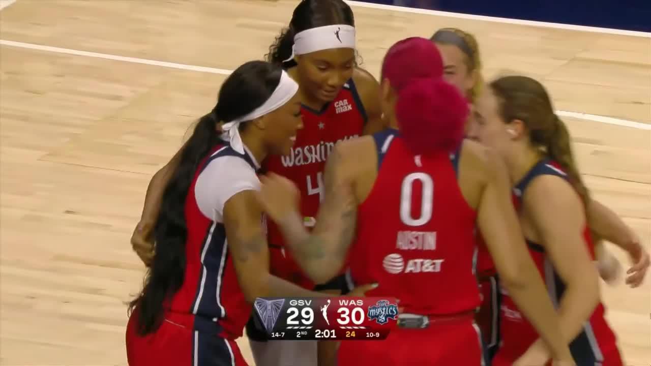 Cotie McMahon fights off defender for and-1