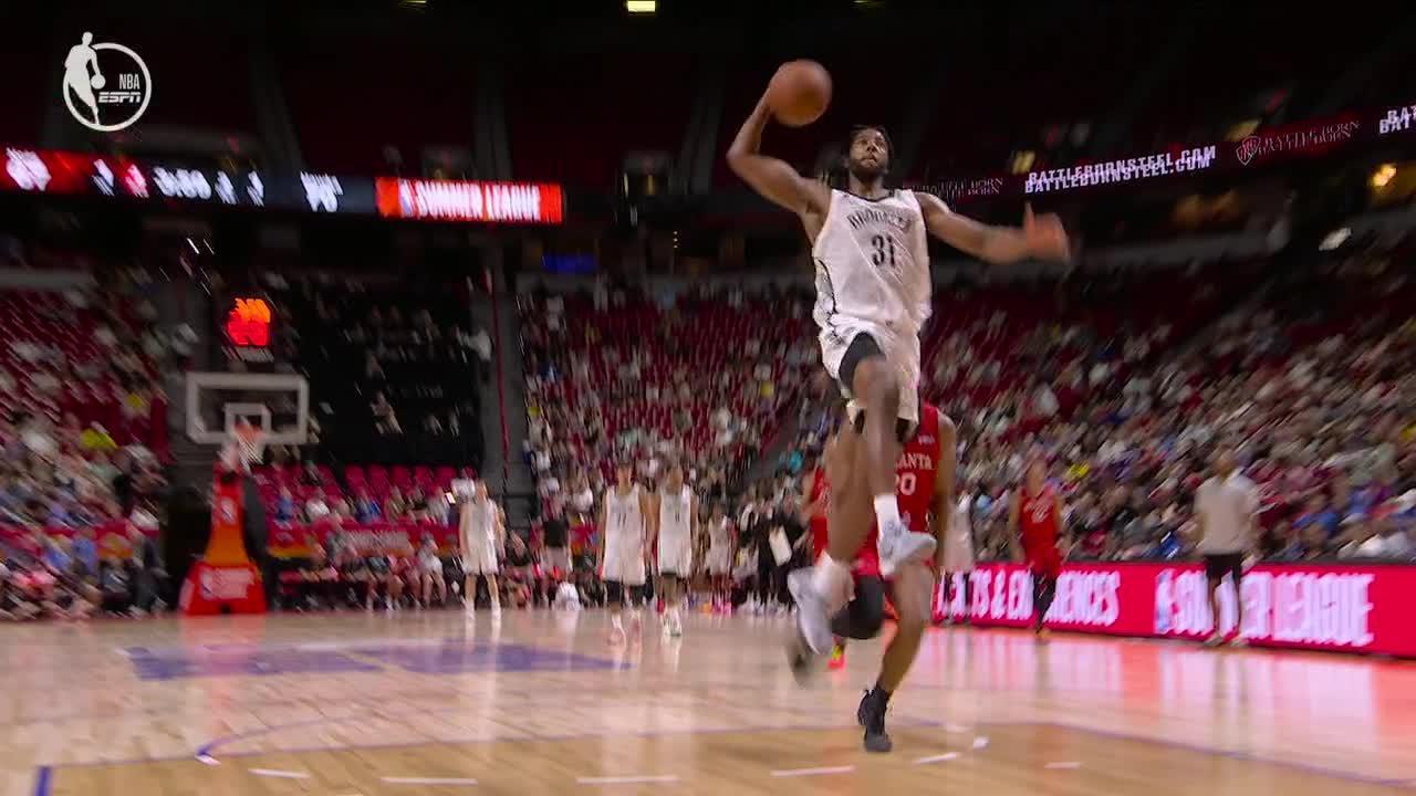 Chaney Johnson rocks the rim with dunk