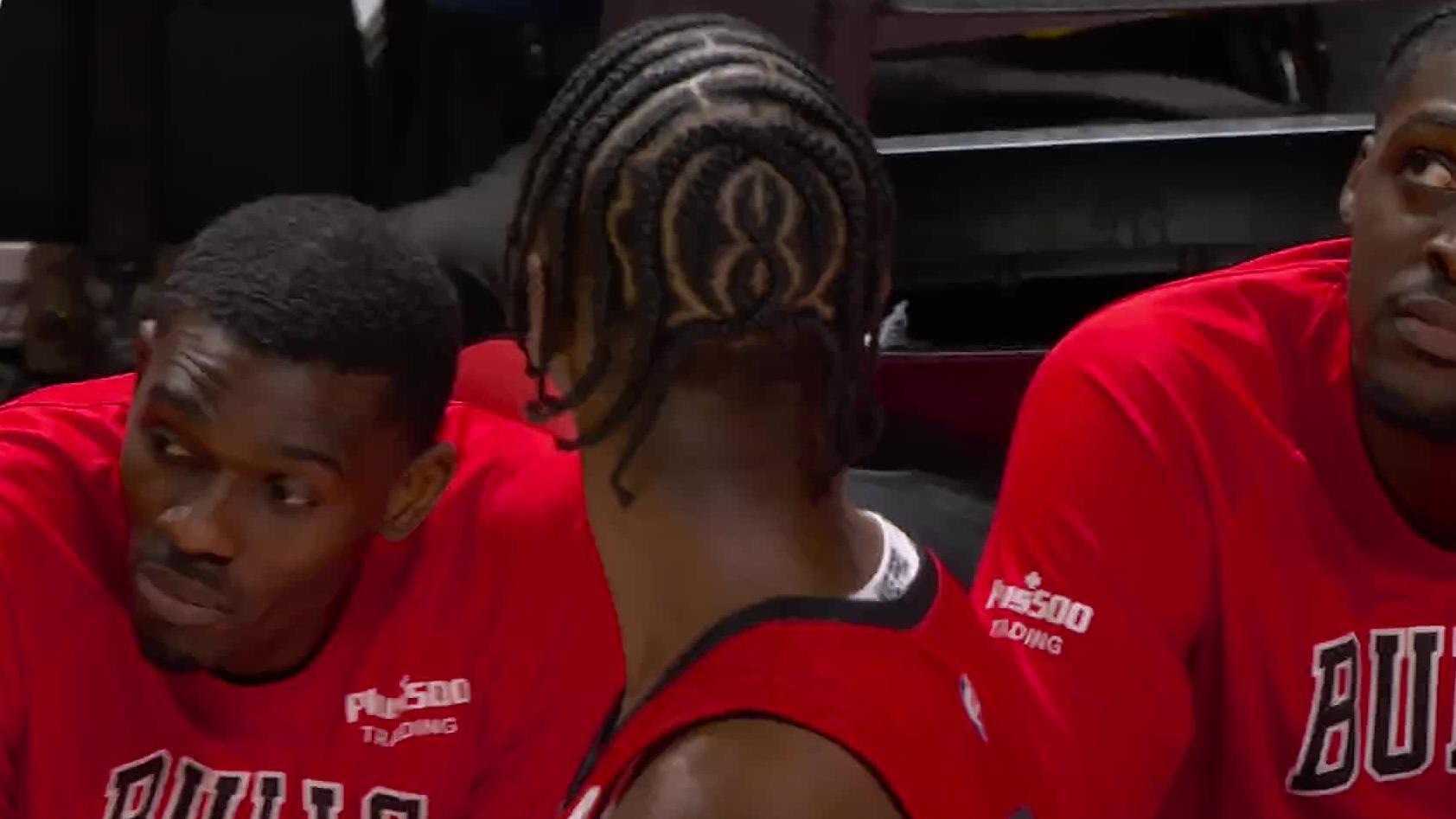 Caleb Wilson has his number 8 braided into his hair