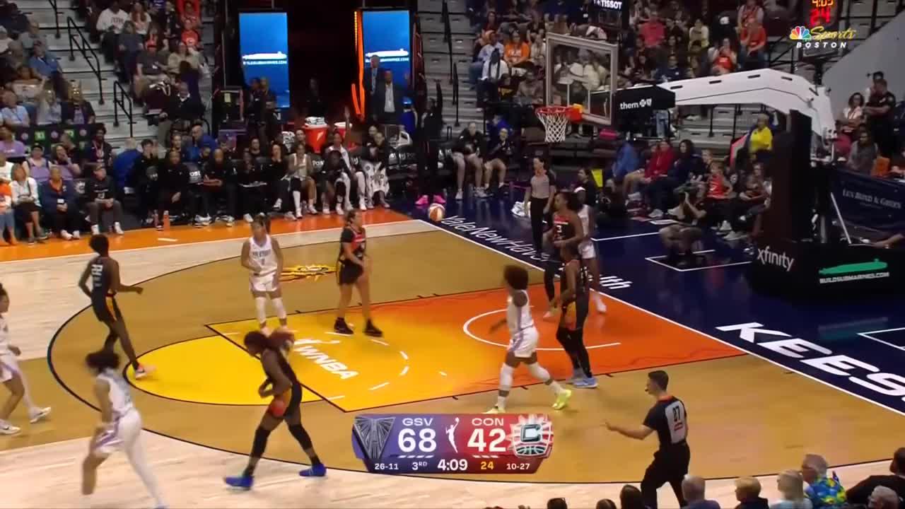 Janelle Salaun shows off the range with 3-pointer