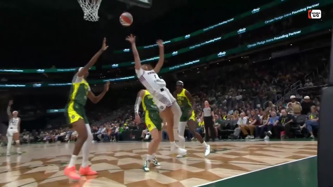 Kiki Rice fights off defender for and-1
