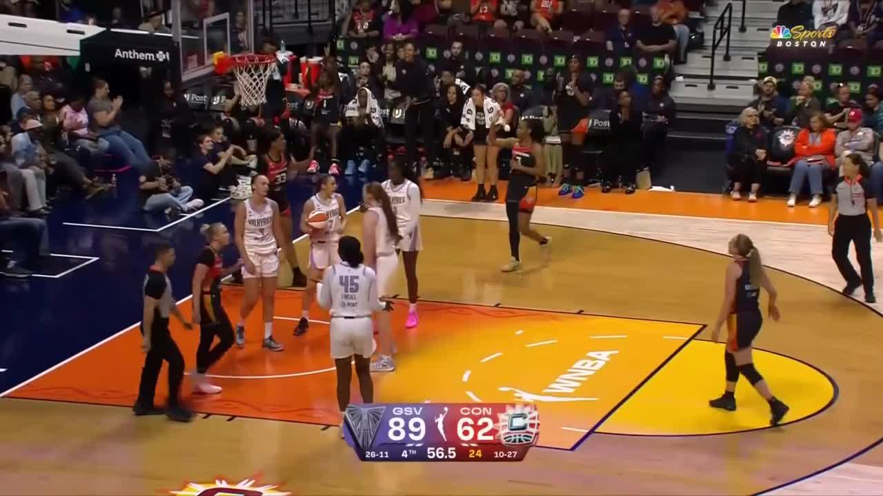 Nell Angloma fights off defender for and-1