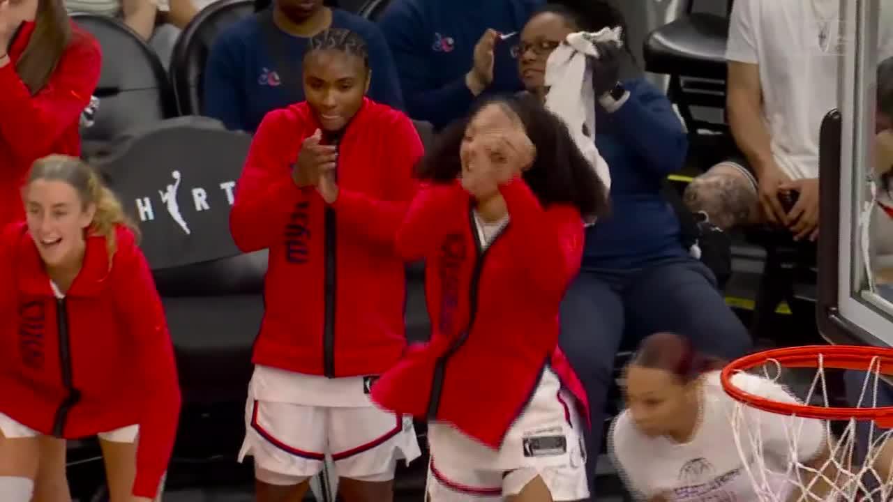 Kiki Iriafen fights off defender for and-1