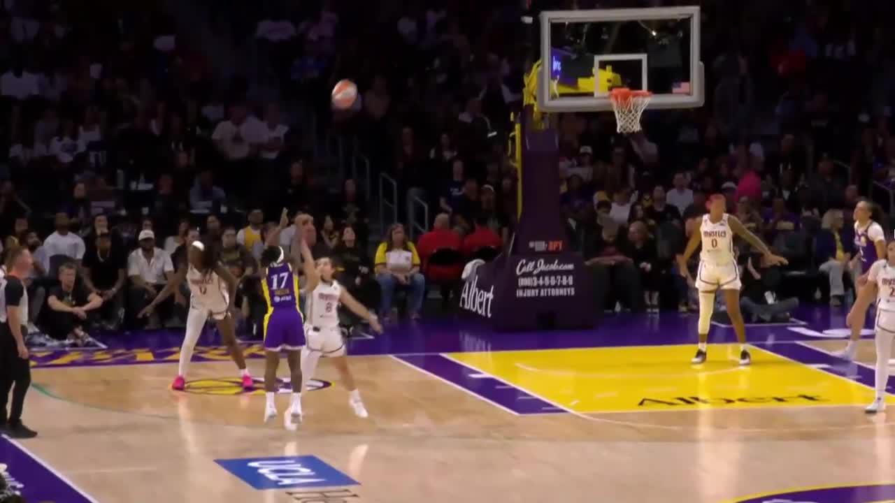 Erica Wheeler drains trey